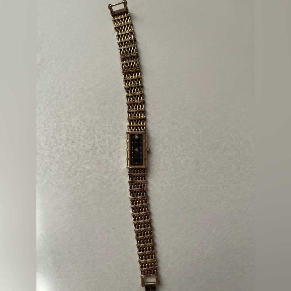 Black and gold watch